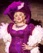 Emily Skinner as Mae West